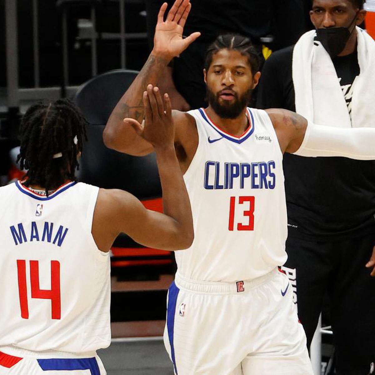 LOS ANGELES, CA - DECEMBER 03: Los Angeles Clippers Guard Paul George (13)  shoots a three pointer during a NBA game between the Portland Trail Blazers  and the Los Angeles Clippers on