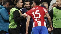 MADRID, SPAIN - APRIL 13: Stefan Savic of Atletico Madrid and Jack Grealish of Manchester City argue during the UEFA Champions League quarter final second leg soccer match between Atletico Madrid and Manchester City at the Estadio Wanda Metropolitano in Madrid, Spain on April 13, 2022. (Photo by Burak Akbulut/Anadolu Agency via Getty Images)