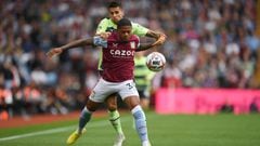 BIRMINGHAM, ENGLAND - SEPTEMBER 03: Leon Bailey of Aston Villa is challenged by Joao Cancelo of Manchester City during the Premier League match between Aston Villa and Manchester City at Villa Park on September 03, 2022 in Birmingham, England. (Photo by Shaun Botterill/Getty Images)