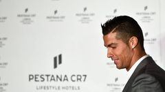 Real Madrid's forward Cristiano Ronaldo arrives onstage to deliver a speech during the official inauguration of the the Pestana CR7 Lisbon Hotel in Lisbon on October 2, 2016.