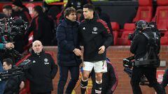 MANCHESTER, ENGLAND - MARCH 12: Antonio Conte of Tottenham Hotspur embraces Cristiano Ronaldo of Manchester United after the Premier League match between Manchester United and Tottenham Hotspur at Old Trafford on March 12, 2022 in Manchester, England. (Photo by Michael Regan/Getty Images)