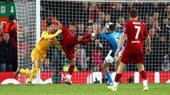LIVERPOOL, ENGLAND - NOVEMBER 27: Roberto Firmino of Liverpool shoots which is then cleared off the line by Kalidou Koulibaly of Napoli (not pictured) during the UEFA Champions League group E match between Liverpool FC and SSC Napoli at Anfield on Novembe