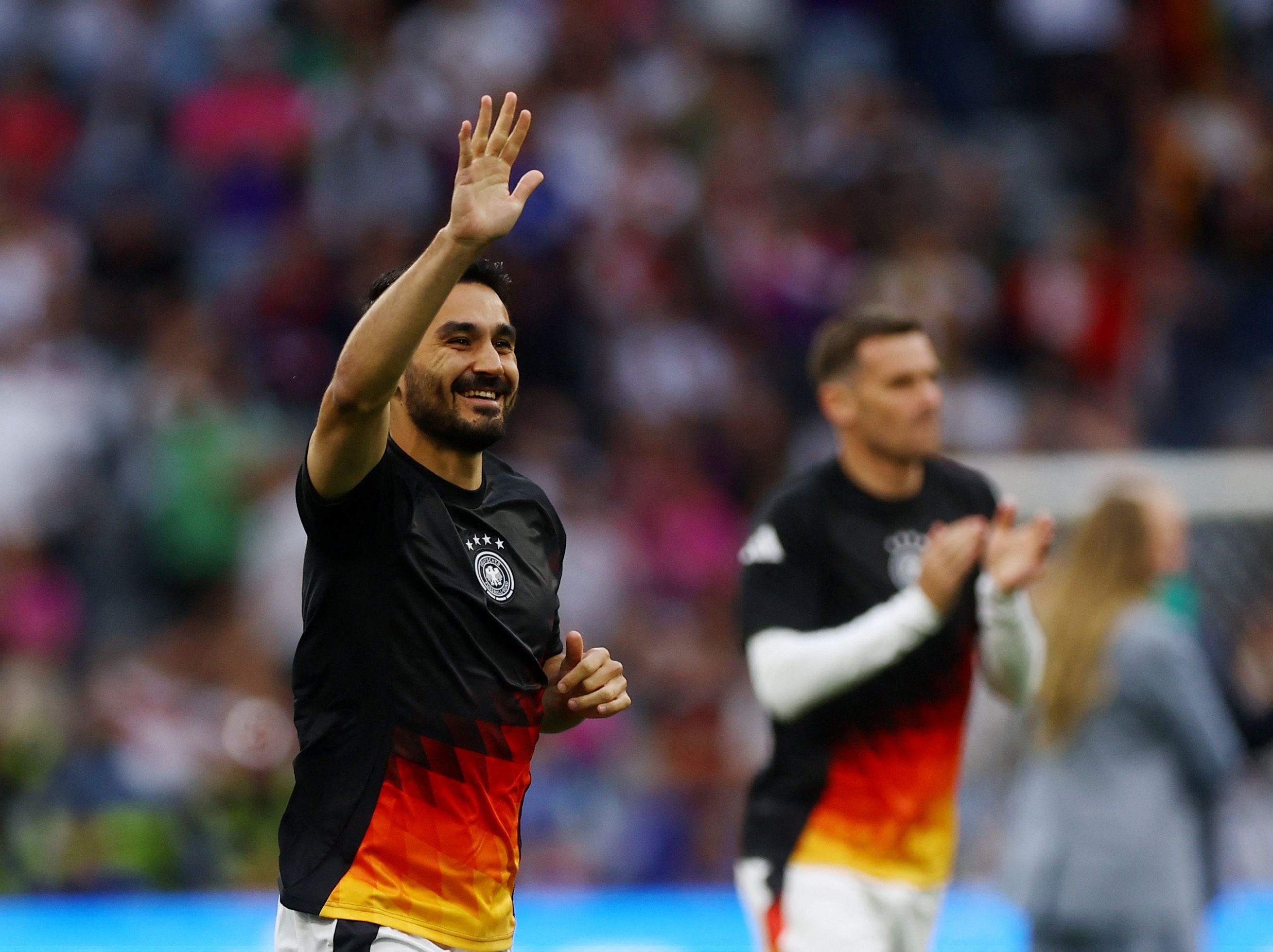 Soccer Football - Euro 2024 - Group A - Germany v Scotland - Munich Football Arena, Munich, Germany - June 14, 2024   Germany's Ilkay Gundogan during the warm up before the match REUTERS/Lee Smith