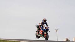 PORTIMAO, PORTUGAL - MARCH 12: Alex Rins of Spain and LCR Honda Castrol  jumps with the bike during the Portimao MotoGP Official Test at Portimao Circuit on March 12, 2023 in Portimao, Portugal. (Photo by Mirco Lazzari gp/Getty Images,)