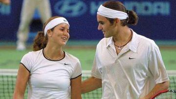 Mirka Vavrinec y Roger Federer, durante un partido en la Hopman Cup de 2002.