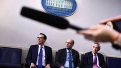 US Secretary of the Treasury Steven Mnuchin, Director of the Office of Management and Budget Russell Vought and coronavirus task force member Scott Atlas attend Donald Trump&#039;s briefing at the White House August 10, 2020, in Washington, DC