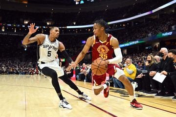 Dejounte Murray defending Cleveland Cavaliers' Isaac Okoro== FOR NEWSPAPERS, INTERNET, TELCOS & TELEVISION USE ONLY ==