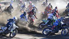 France's Romain Febvre (Center R, #3) and Swiss Jeremy Seewer (Bottom R) compete during the start of the MXGP qualification race in the Motocross GP world championship competition in Hyvinka, Finland, on August 13, 2022. - Finland OUT (Photo by Jussi Nukari / Lehtikuva / AFP) / Finland OUT (Photo by JUSSI NUKARI/Lehtikuva/AFP via Getty Images)