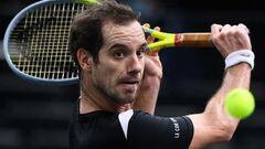 France&#039;s Richard Gasquet eyes the ball as he returns it to Argentina&#039;s Diego Schwartzman during their men&#039;s singles second round tennis match on day 3 at the ATP World Tour Masters 1000 - Paris Masters (Paris Bercy) - indoor tennis tourname