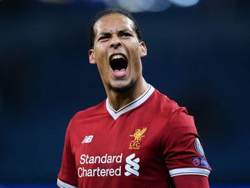 MANCHESTER, ENGLAND - APRIL 10:  Virgil van Dijk of Liverpool celebrates his sides victory after the UEFA Champions League Quarter Final Second Leg match between Manchester City and Liverpool at Etihad Stadium on April 10, 2018 in Manchester, England.  (Photo by Laurence Griffiths/Getty Images,)