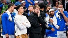 Apr 7, 2023; Dallas, Texas, USA; Dallas Mavericks guard Josh Green (8) and guard Luka Doncic (77) and forward Reggie Bullock (25) and forward Markieff Morris (13) and center JaVale McGee (00) watch the game between the Dallas Mavericks and the Chicago Bulls during the second half at the American Airlines Center. Mandatory Credit: Jerome Miron-USA TODAY Sports