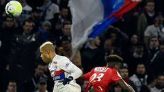 Lyon&#039;s Spanish forward Mariano Diaz (L) vies with Montpellier&#039;s French defender Nordi Mukiele (R) as they head the ball during the French L1 football match between Lyon (OL) and Montpellier (MHSC), on November 19, 2017 at the Groupama stadium in