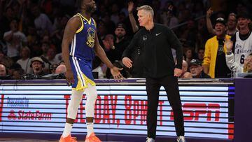 LOS ANGELES, CALIFORNIA - MAY 12: Draymond Green #23 of the Golden State Warriors high fives head coach Steve Kerr during the fourth quarter against the Los Angeles Lakers in game six of the Western Conference Semifinal Playoffs at Crypto.com Arena on May 12, 2023 in Los Angeles, California. NOTE TO USER: User expressly acknowledges and agrees that, by downloading and or using this photograph, User is consenting to the terms and conditions of the Getty Images License Agreement.   Harry How/Getty Images/AFP (Photo by Harry How / GETTY IMAGES NORTH AMERICA / Getty Images via AFP)
