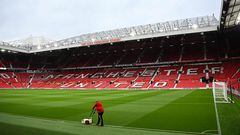 (FILES) In this file photo taken on August 22, 2022 A groundsman paints the lines as final preparations are done ahead of the English Premier League football match between Manchester United and Liverpool at Old Trafford in Manchester, north west England. - Manchester United's owners said on November 22, 2022,  they were ready to sell the club after was earlier confirmed star player  Cristiano Ronaldo was leaving the Premier League giants.Weeks of turbulence at Old Trafford appeared to have come to an end when the club announced Ronaldo was leaving with "immediate effect". (Photo by Paul ELLIS / AFP) / RESTRICTED TO EDITORIAL USE. No use with unauthorized audio, video, data, fixture lists, club/league logos or 'live' services. Online in-match use limited to 120 images. An additional 40 images may be used in extra time. No video emulation. Social media in-match use limited to 120 images. An additional 40 images may be used in extra time. No use in betting publications, games or single club/league/player publications. / 