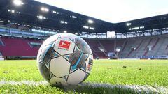 A football sits on the pitch prior to the  German first division Bundesliga football match FC Augsburg v VfL Wolfsburg on May 16, 2020 in Augsburg, southern Germany, as the season resumed following a two-month absence due to the novel coronavirus COVID-19
