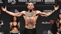 ABU DHABI, UNITED ARAB EMIRATES - JANUARY 22:  In this handout image provided by the UFC, Conor McGregor of Ireland poses on the scale during the UFC 257 weigh-in at Etihad Arena on UFC Fight Island on January 22, 2021 in Abu Dhabi, United Arab Emirates. 