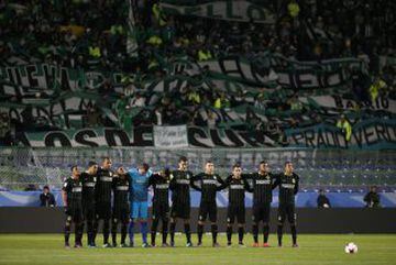 Football Soccer - Atletico Nacional v Kashima Antlers - FIFA Club World Cup Semi Final - Suita City Football Stadium, Osaka, Japan - 14/12/16 Atletico Nacional players observe a minutes silence as respect for the victims of the Colombia plane crash contai