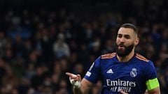 Real Madrid's French striker Karim Benzema after scoring a penalty kick and his team third goal during the UEFA Champions League semi-final first leg football match between Manchester City and Real Madrid, at the Etihad Stadium, in Manchester, on April 26, 2022. (Photo by Paul ELLIS / AFP)