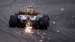SHANGHAI, CHINA - APRIL 14: Sparks fly behind Carlos Sainz of Spain driving the (55) Renault Sport Formula One Team RS18 on track  during qualifying for the Formula One Grand Prix of China at Shanghai International Circuit on April 14, 2018 in Shanghai, C