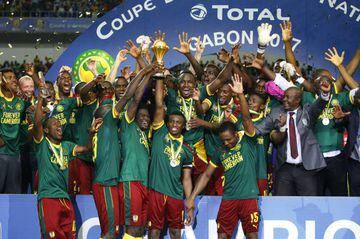 Cameroon celebrate with the trophy after winning the Africa Cup of Nations.