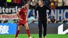 Spain's midfielder #08 Koke (L) and Spain's coach Luis Enrique (R) reacts after the Qatar 2022 World Cup Group E football match between Spain and Germany at the Al-Bayt Stadium in Al Khor, north of Doha on November 27, 2022. (Photo by JAVIER SORIANO / AFP)