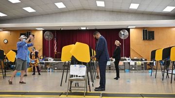 Conservative talk show host and gubernatorial recall candidate Larry Elder votes at a polling station iin Los Angeles, California, September 8, 2021 ahead of the special recall election. 
