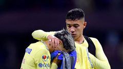 America's Chilean midfielder Diego Valdes (L) and Mexican defender Emilio Lara (R) react after their defeat during the Mexican Clausura tournament semifinal secong leg football match between America and Guadalajara at Azteca stadium in Mexico City, on May 21, 2023. (Photo by CLAUDIO CRUZ / AFP)