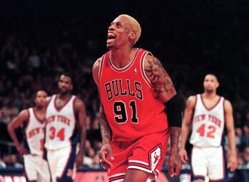 Back in the day | New York Knicks' Chris Childs, Charles Oakley and Chris Mills watch a taunting, laughing Chicago Bulls forward Dennis Rodman.