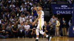 (FILES) This file photo taken on October 17, 2017 shows Stephen Curry #30 of the Golden State Warriors reacting during the match against the Houston Rockets at ORACLE Arena in Oakland, California.  / AFP PHOTO / GETTY IMAGES NORTH AMERICA / EZRA SHAW
