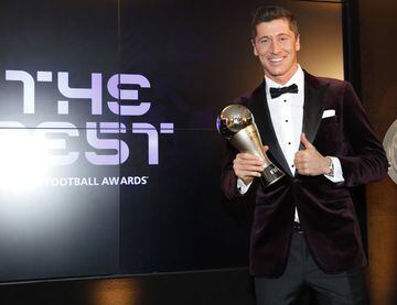 MUNICH, GERMANY - DECEMBER 17: Robert Lewandowski of FC Bayern Muenchen poses after winning the FIFA Men's Player 2020 trophy during the FIFA The BEST Awards ceremony on December 17, 2020 in Munich, Germany.
