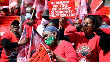 Members of The National Education, Health and Allied Workers&#039; Union (NEHAWU) hold placards during a picket outside the Union building, as the coronavirus disease (COVID-19) lockdown regulations ease in Pretoria, South Africa, September 3, 2020. REUTE