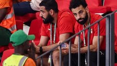 Egypt's forward #10 Mohamed Salah (R) looks on as he attends the Africa Cup of Nations (CAN) 2024 group A football match between Guinea-Bissau and Nigeria at the Felix Houphouet-Boigny Stadium in Abidjan on January 22, 2024. (Photo by FRANCK FIFE / AFP)