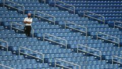 ST. PETERSBURG, FL - JULY 25: A security guard watches a baseball game between the Toronto Blue Jays and Tampa Bay Rays at Tropicana Field on July 25, 2020 in St. Petersburg, Florida.   Mike Carlson/Getty Images/AFP == FOR NEWSPAPERS, INTERNET, TELCOS &a