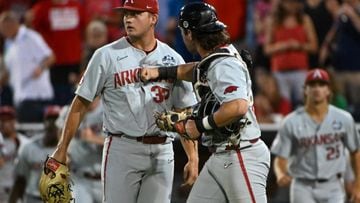 In the most dramatic game yet in the 2022 College World Series, the Arkansas Razorbacks live to fight another day, in a 3-2 defeat of the Ole Miss Rebels