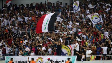 Fans watch the AFC Cup football match between Iraq&#039;s Al-Zawraa club and Lebanon&#039;s Al-Ahed club at the Karbala Sports City stadium on April 10, 2018. Iraq is hosting a foreign football club for a competitive match for the first time in decades, 