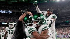 EAST RUTHERFORD, NEW JERSEY - SEPTEMBER 11: Wide receiver Xavier Gipson #82 of the New York Jets celebrates with Allen Lazard #10, Michael Carter II #30 and head coach Robert Saleh after scoring the game winning touchdown on a 65-yard punt return during the overtime quarter of the NFL game against the Buffalo Bills at MetLife Stadium on September 11, 2023 in East Rutherford, New Jersey. The Jets defeated the Bills 22-16 in overtime.   Elsa/Getty Images/AFP (Photo by ELSA / GETTY IMAGES NORTH AMERICA / Getty Images via AFP)