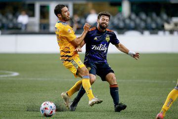Aug 10, 2021; Seattle, WA, USA; Tigres UANL defender Jorge Torres (6) collides with Seattle Sounders FC midfielder Joao Paulo (6) during the second half at Lumen Field. Mandatory Credit: Jennifer Buchanan-USA TODAY Sports