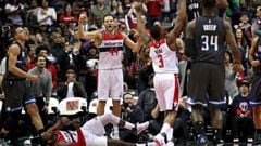 WASHINGTON, DC - MARCH 05: Bojan Bogdanovic #44, Bradley Beal #3 and John Wall #2 of the Washington Wizards celebrate after defeating Aaron Gordon #00 and the Orlando Magic at Verizon Center on March 5, 2017 in Washington, DC. NOTE TO USER: User expressly