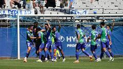 Los jugadores del Málaga celebrando el 1-2, obra de Dioni.