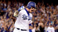 LOS ANGELES, CA - OCTOBER 18: Yasmani Grandal #9 of the Los Angeles Dodgers celebrates as he hits a two-run home run in the fourth inning against the Chicago Cubs in game three of the National League Championship Series at Dodger Stadium on October 18, 20