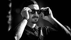 DUBAI, UNITED ARAB EMIRATES - DECEMBER 12:  (EDITORS NOTE: Image has been converted to black and white.) Zlatan Ibrahimovic of AC Milan looks on before the AC Milan press conference on December 12, 2022 in Dubai, United Arab Emirates. (Photo by Claudio Villa/AC Milan via Getty Images)