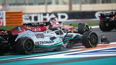 Pelea de Carlos Sainz (Ferrari F1-75) y Lewis Hamilton (Mercedes W13) en Yas Marina, Abu Dhabi. F1 2022.
