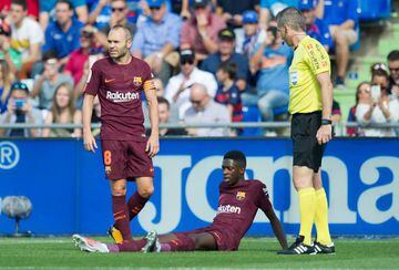Ousmane Dembele lies injured during the La Liga match between Getafe and Barcelona