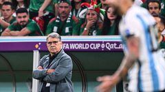 Mexico's Argentinian coach Gerardo Martino follows the action from the sidelines during the Qatar 2022 World Cup Group C football match between Argentina and Mexico at the Lusail Stadium in Lusail, north of Doha on November 26, 2022. (Photo by Kirill KUDRYAVTSEV / AFP)