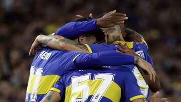 Boca Juniors' midfielder Martin Payero celebrates with teammates after scoring a goal against Belgrano during the Argentine Professional Football League Tournament 2023 match at La Bombonera stadium in Buenos Aires, on May 14, 2023. (Photo by ALEJANDRO PAGNI / AFP)