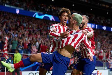 Antoine Griezmann (centre) celebrates his last-gasp winner with Atlético Madrid team-mates João Félix (left) and Mario Hermoso.