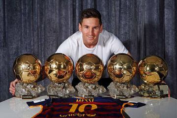 FC Barcelona and Argentina's forward Lionel Messi poses with his five ballon d'Or on January 12, 2016