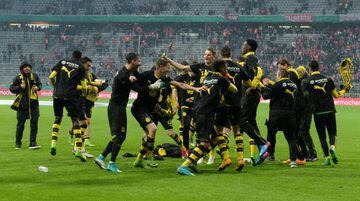 Dortmund team celebrates after the German Cup DFB Pokal semifinal football match against FC Bayern Munich.
