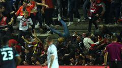 TOPSHOT - LOSC&#039;s supporters react as their tribune falls down following the goal by LOSC&#039;s Cameroonian midfielder Ibrahim Amadou during the French L1 football match between Amiens and Lille LOSC on September 30, 2017 at the Licorne stadium in Am