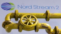 3D printed Natural Gas Pipes are placed on displayed Nord Stream 2 logo in this illustration taken, January 31, 2022. 